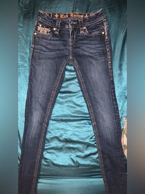Rock Revival Dark Indigo Skinny Jeans with Embellished Pockets and Side Studs